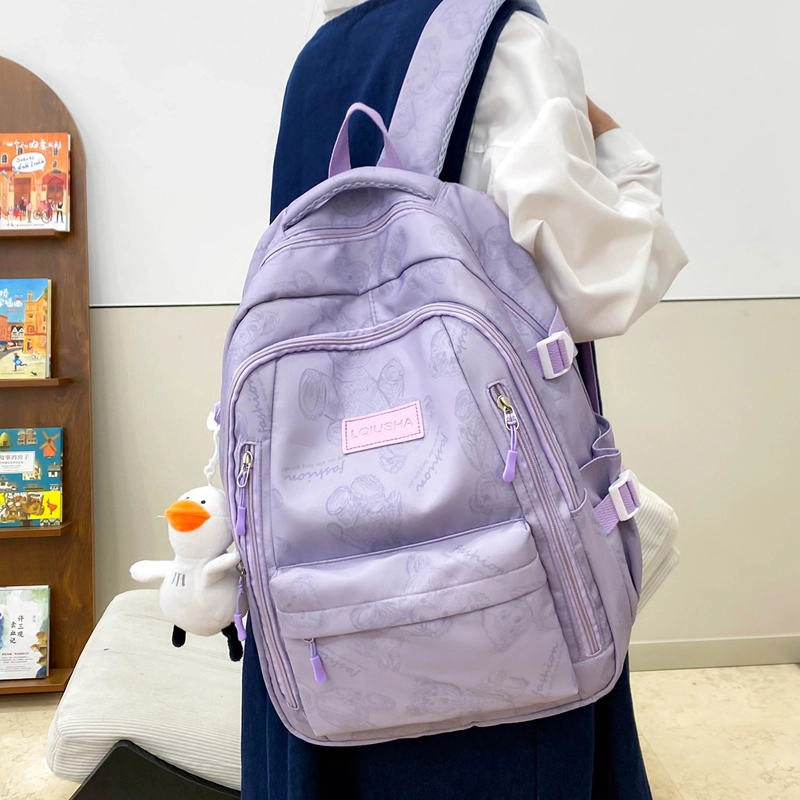 泰格奴 印花轻便简约大容量运动耐磨背包初中生高中生大学生上课百搭书包 尼龙 双肩包 男女同款情侣款 米白色/黑色/紫色/绿色