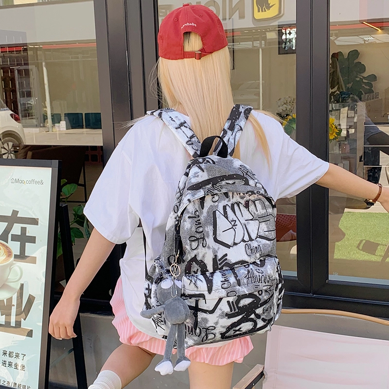 泰格奴 涂鸦精美机能通勤旅行小清新轻便高颜值大容量背包初中高中大学生上课百搭书包 尼龙布 双肩包 男女同款情侣款 灰白色/黑白色