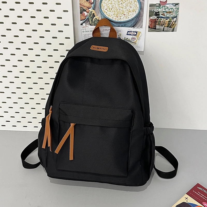 泰格奴 简约日系纯色休闲通勤旅行轻便高颜值大容量背包初中高中大学上课百搭书包 尼龙 双肩包 男女同款情侣款 黑色/白色/蓝色/红色