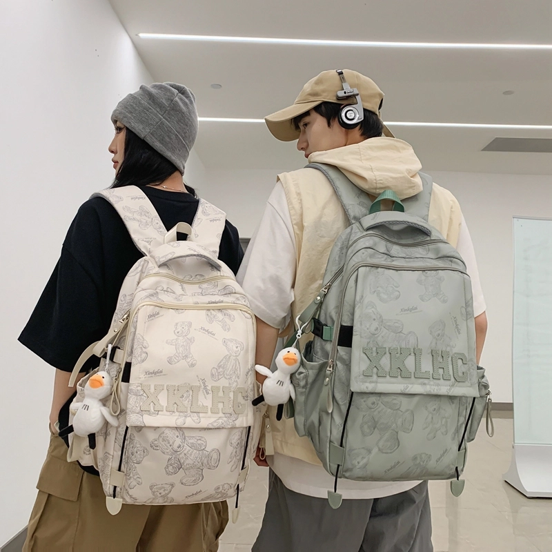 泰格奴 字母印花轻便国风大容量运动背包初中生高中生大学生上课百搭书包 尼龙 双肩包 男女同款情侣款 米白色/黑色/红色/绿色