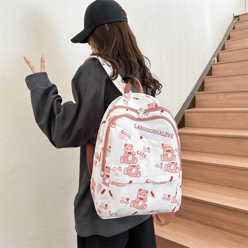 泰格奴 涂鸦精美通勤旅行小清新轻便高颜值大容量背包初中高中大学生上课百搭书包 牛津布 双肩包 女款 紫罗兰/湖蓝色/黄色/棕色