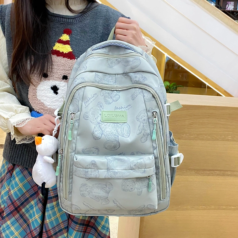 泰格奴 印花轻便简约大容量运动耐磨背包初中生高中生大学生上课百搭书包 尼龙 双肩包 男女同款情侣款 米白色/黑色/紫色/绿色