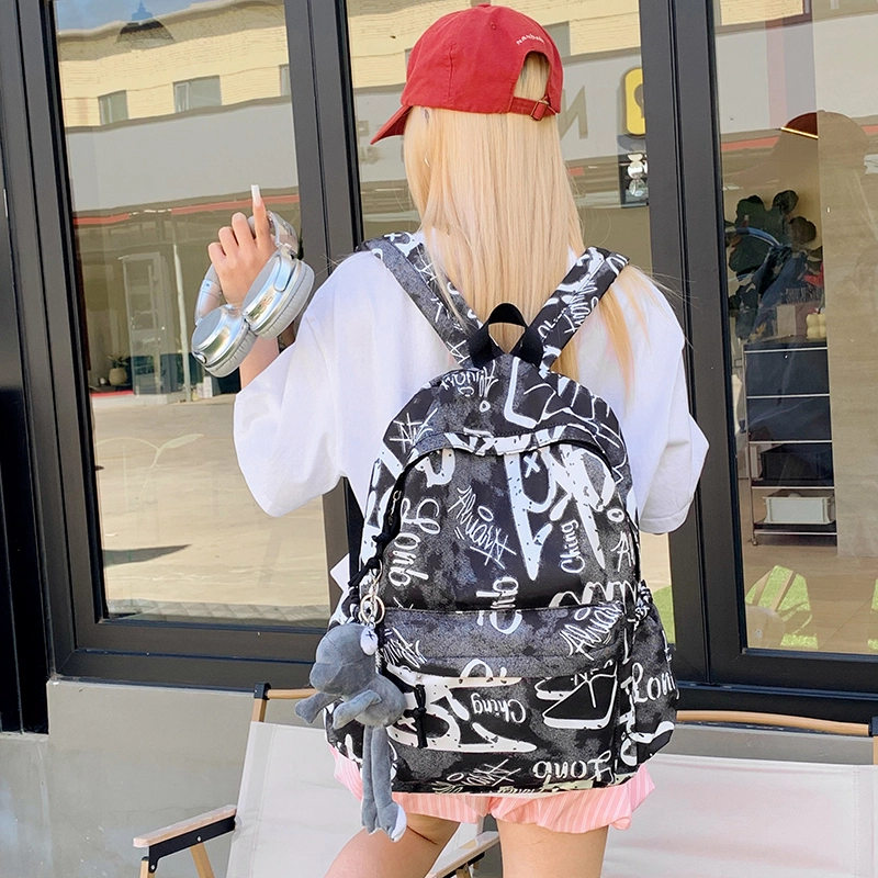 泰格奴 涂鸦精美机能通勤旅行小清新轻便高颜值大容量背包初中高中大学生上课百搭书包 尼龙布 双肩包 男女同款情侣款 灰白色/黑白色
