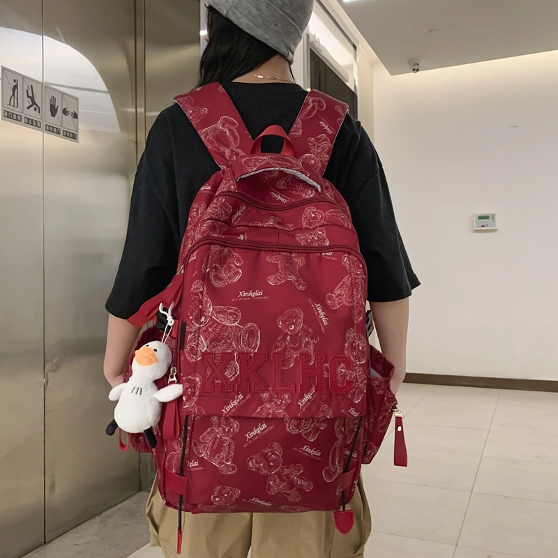 泰格奴 字母印花轻便国风大容量运动背包初中生高中生大学生上课百搭书包 尼龙 双肩包 男女同款情侣款 米白色/黑色/红色/绿色
