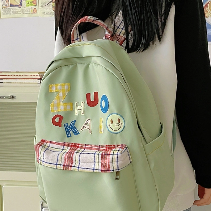 泰格奴 字母印花轻便简约国风大容量运动耐磨背包初中生高中生大学生上课百搭书包 尼龙 双肩包 女款 白色绿色黄色蓝色