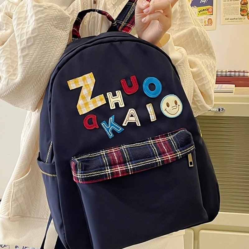 泰格奴 字母印花轻便简约国风大容量运动耐磨背包初中生高中生大学生上课百搭书包 尼龙 双肩包 女款 白色绿色黄色蓝色