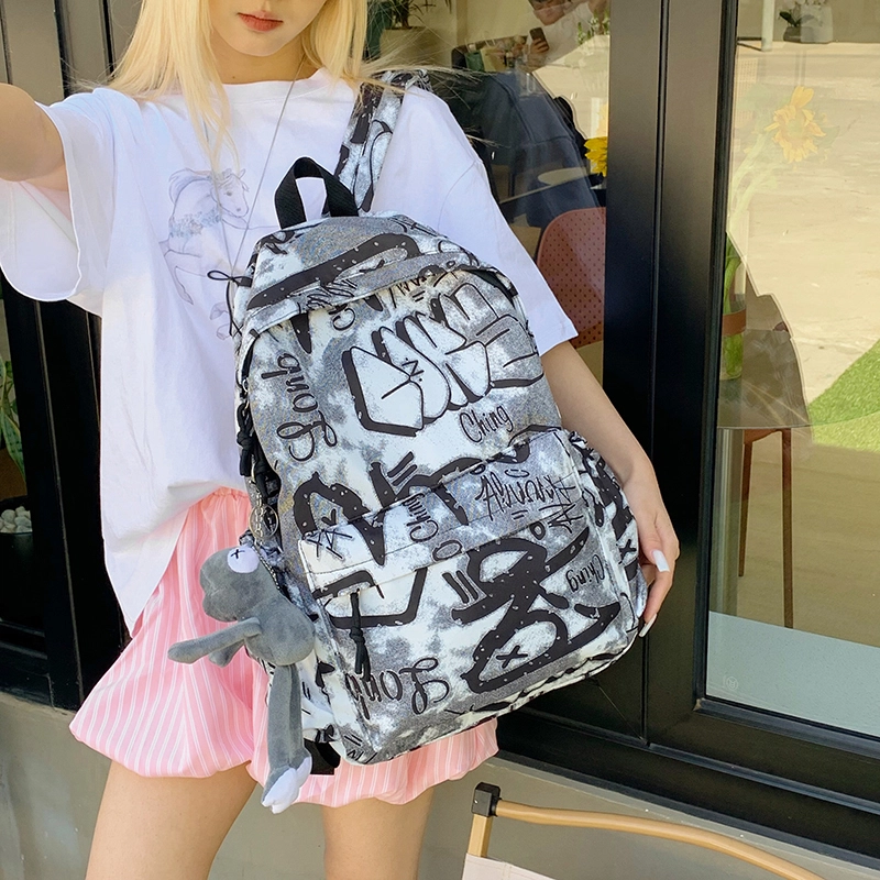 泰格奴 涂鸦精美机能通勤旅行小清新轻便高颜值大容量背包初中高中大学生上课百搭书包 尼龙布 双肩包 男女同款情侣款 灰白色/黑白色