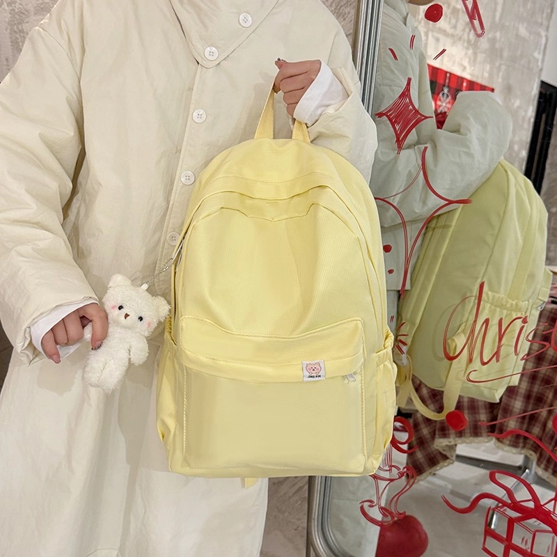 泰格奴 小清新休闲高颜值精美潮版韩版背包初中生高中生大学生上课百搭书包 尼龙 双肩包 常规 女款 浅黄色粉色