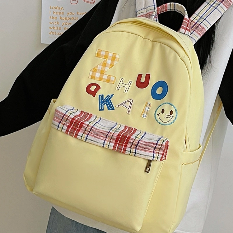 泰格奴 字母印花轻便简约国风大容量运动耐磨背包初中生高中生大学生上课百搭书包 尼龙 双肩包 女款 白色绿色黄色蓝色