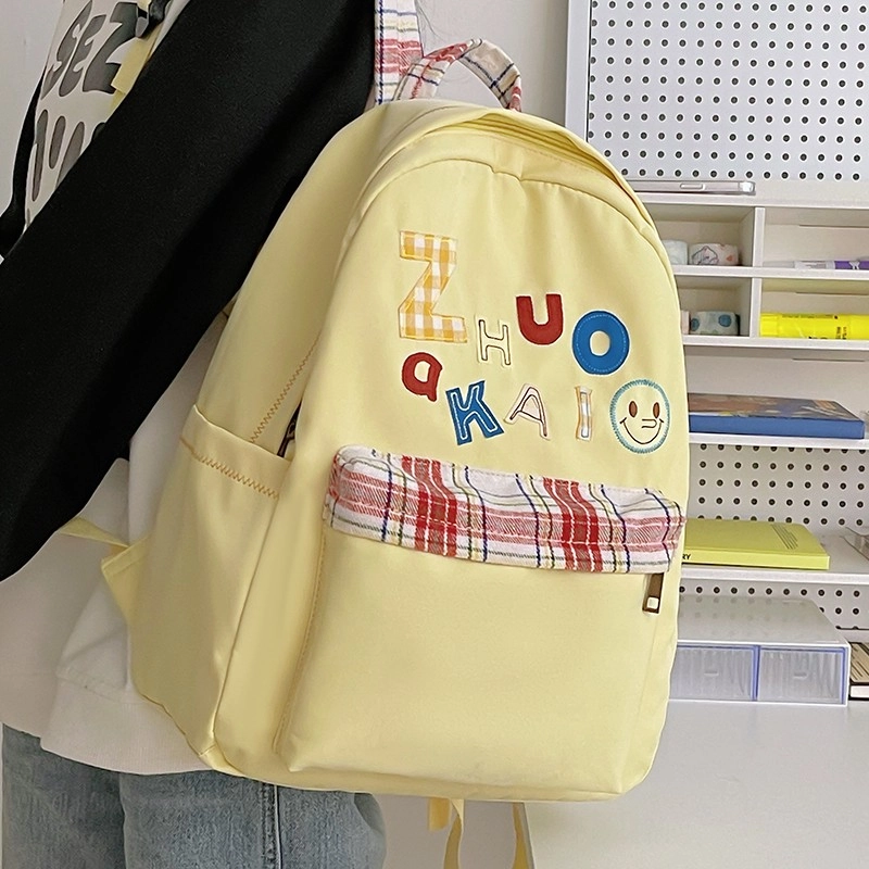 泰格奴 字母印花轻便简约国风大容量运动耐磨背包初中生高中生大学生上课百搭书包 尼龙 双肩包 女款 白色绿色黄色蓝色