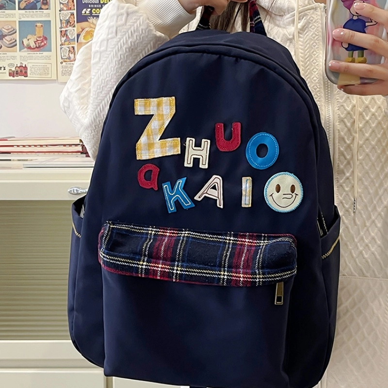 泰格奴 字母印花轻便简约国风大容量运动耐磨背包初中生高中生大学生上课百搭书包 尼龙 双肩包 女款 白色绿色黄色蓝色