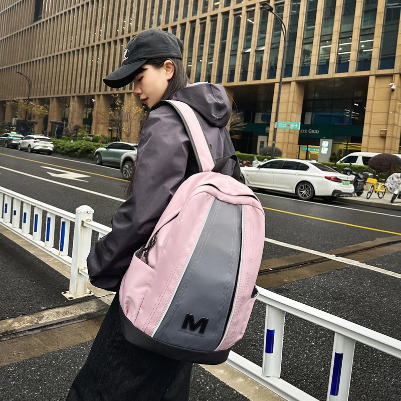 泰格奴 撞色系轻便百搭个性气质高级感潮流时尚初中高中大学生上课书包 尼龙 双肩包 男女同款情侣款 乳白色/米白色/粉红色/黑色