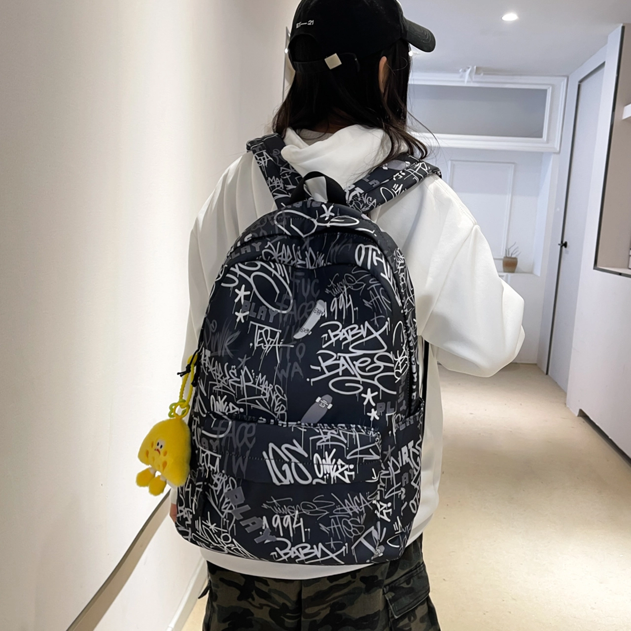 泰格奴 字母印花轻便简约国风大容量运动耐磨背包初中生高中生大学生上课百搭书包 尼龙布 双肩包 男女同款情侣款 蓝色/黑色