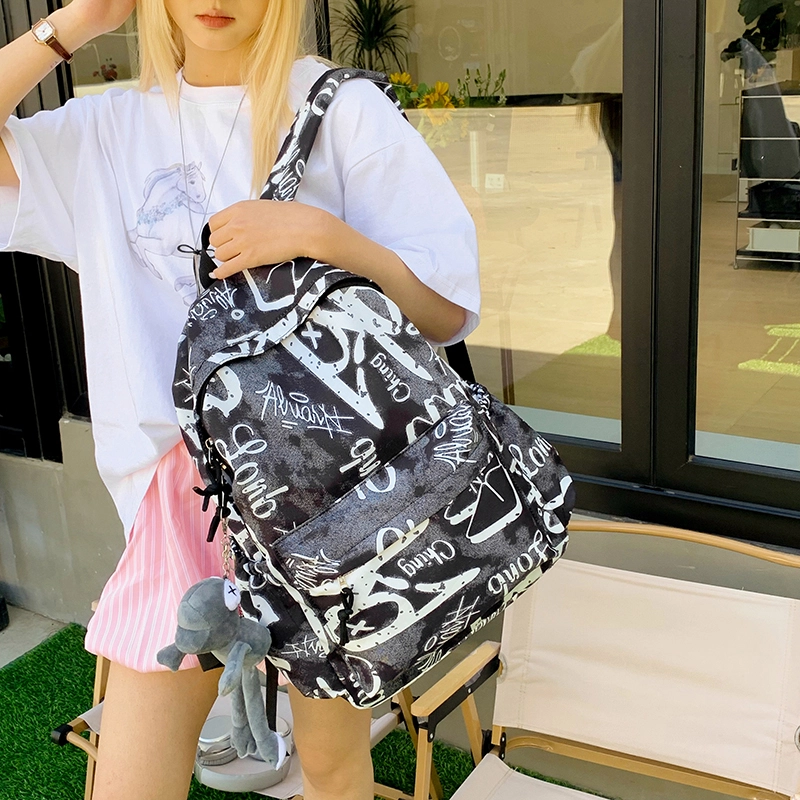 泰格奴 涂鸦精美机能通勤旅行小清新轻便高颜值大容量背包初中高中大学生上课百搭书包 尼龙布 双肩包 男女同款情侣款 灰白色/黑白色