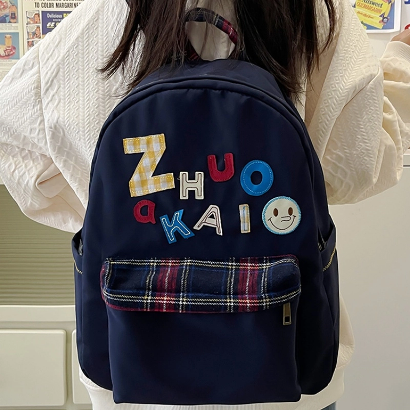 泰格奴 字母印花轻便简约国风大容量运动耐磨背包初中生高中生大学生上课百搭书包 尼龙 双肩包 女款 白色绿色黄色蓝色