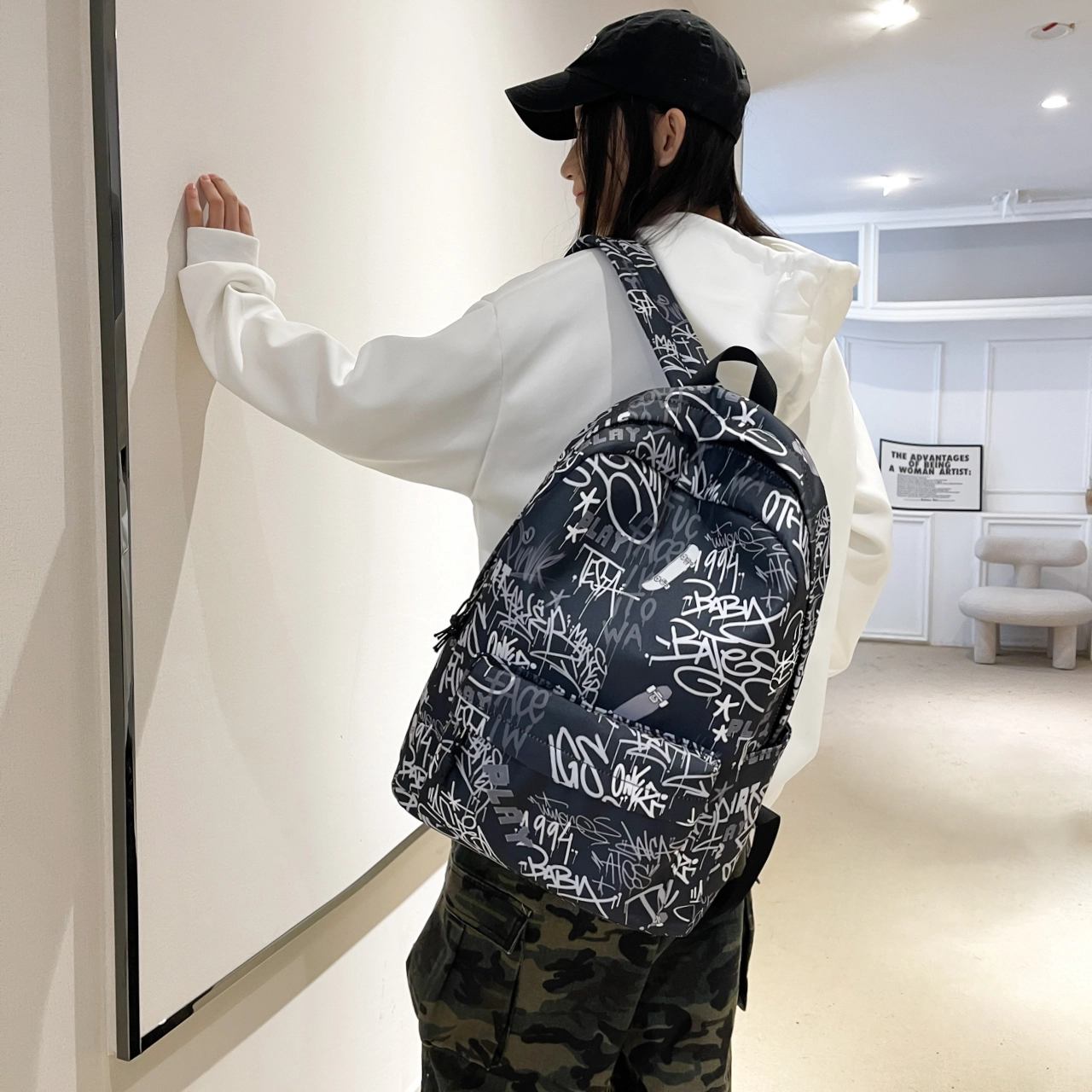 泰格奴 字母印花轻便简约国风大容量运动耐磨背包初中生高中生大学生上课百搭书包 尼龙布 双肩包 男女同款情侣款 蓝色/黑色