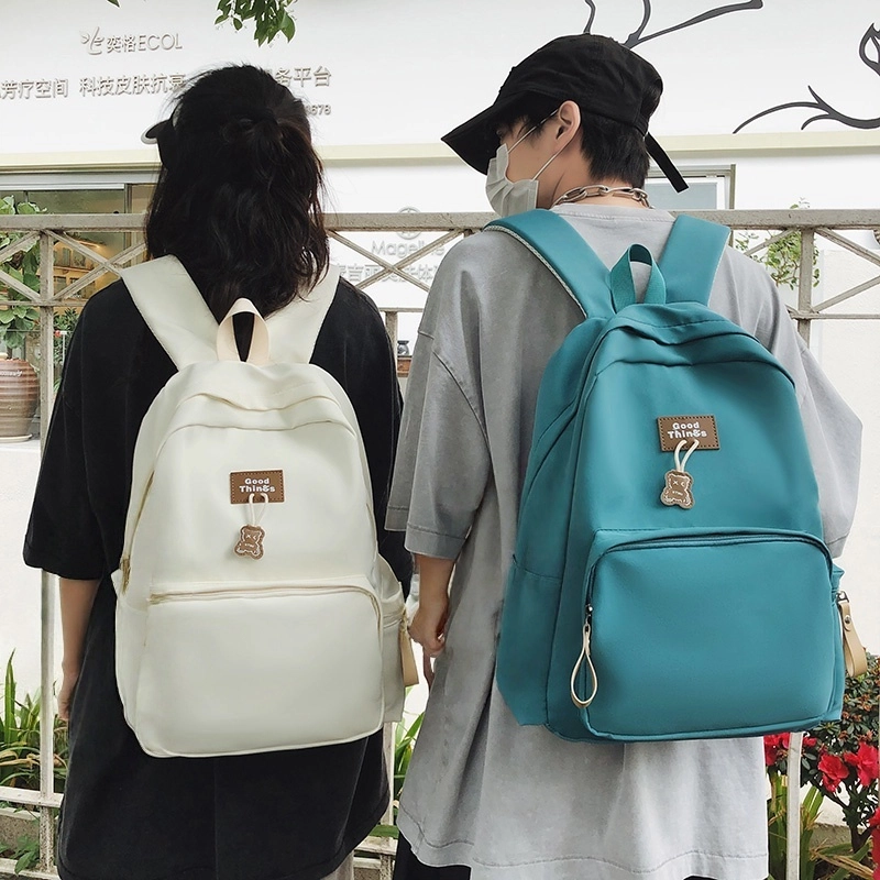 泰格奴 工装机能百搭个性运动街头旅行大容量背包初高中生大学生上课书包 尼龙 双肩包 男女同款情侣款 白色/黑色/卡其色/孔雀蓝