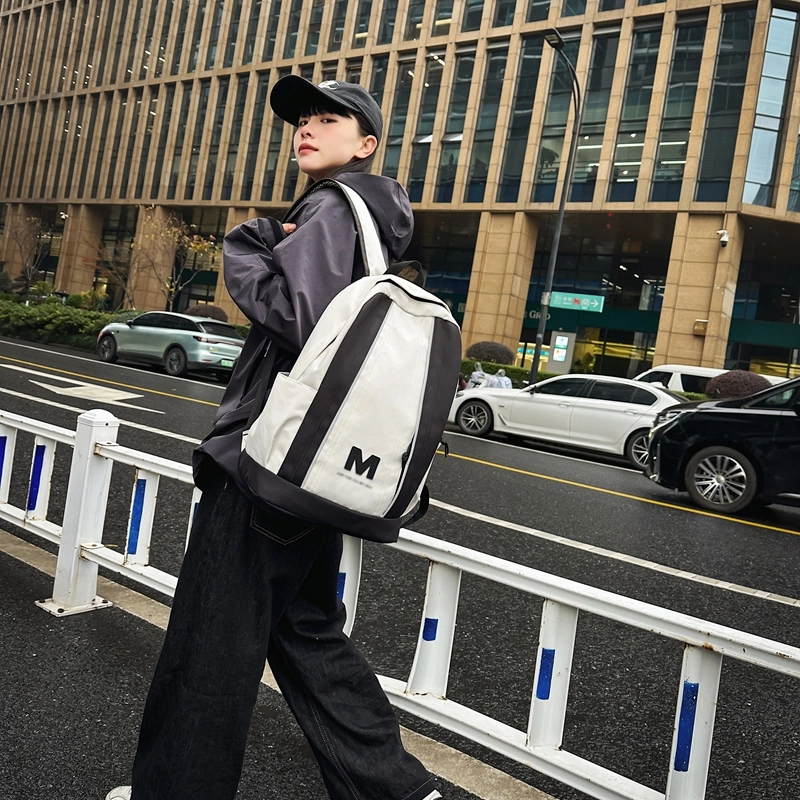 泰格奴 撞色系轻便百搭个性气质高级感潮流时尚初中高中大学生上课书包 尼龙 双肩包 男女同款情侣款 乳白色/米白色/粉红色/黑色