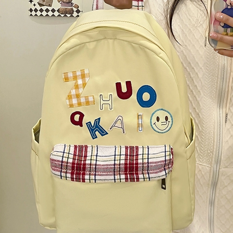 泰格奴 字母印花轻便简约国风大容量运动耐磨背包初中生高中生大学生上课百搭书包 尼龙 双肩包 女款 白色绿色黄色蓝色