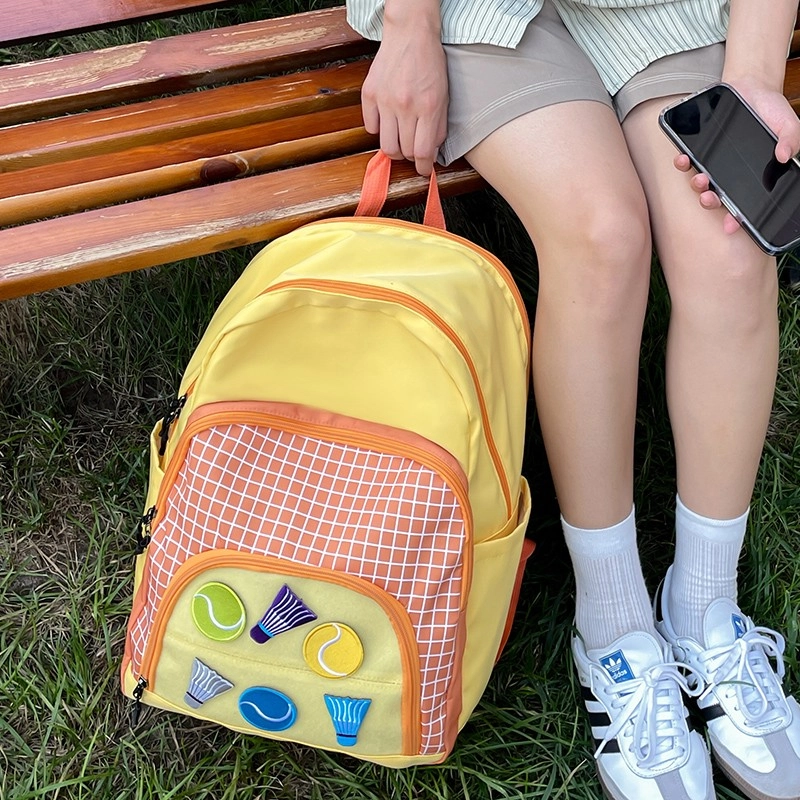 泰格奴 撞色格子设计感百搭 尼龙 书包背包双肩包 女款 黄色粉色蓝色