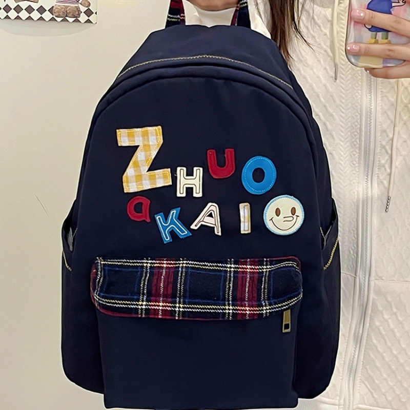 泰格奴 字母印花轻便简约国风大容量运动耐磨背包初中生高中生大学生上课百搭书包 尼龙 双肩包 女款 白色绿色黄色蓝色