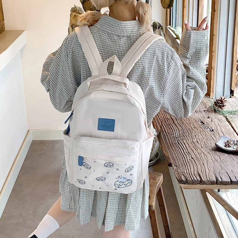 泰格奴 涂鸦精美机能通勤旅行小清新轻便高颜值大容量背包初中高中大学生上课百搭书包 尼龙布 双肩包 女款 米白色