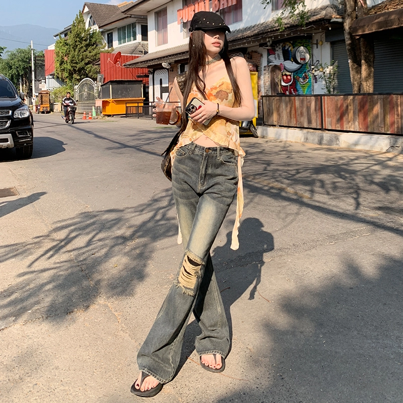 玫丝朵 美式复古酷飒破洞流苏设计时尚百搭喇叭牛仔裤 女款