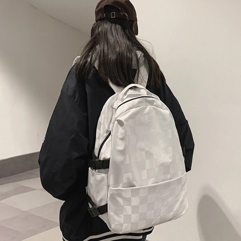 维多利亚旅行者 潮牌棋盘格通勤上课旅游大容量简约款 尼龙 双肩包背包书包 男女同款情侣款 黑白棋盘格