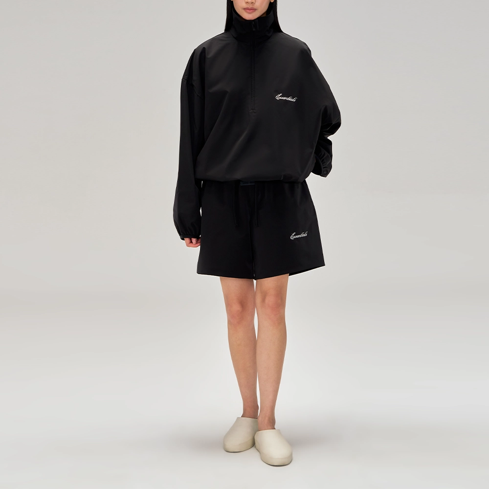 Fear of God Essentials SS25 25 PRING DROP1 SPORTY NYLON SOCCER SHORT JET BLACK ESSENTIALS FEAR OF GOD