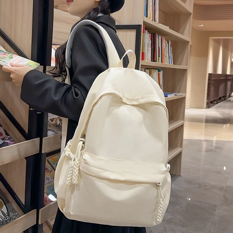 泰克森 简约背包大学生旅行 尼龙 双肩包 中号 男女同款情侣款 黑色,白色,红色