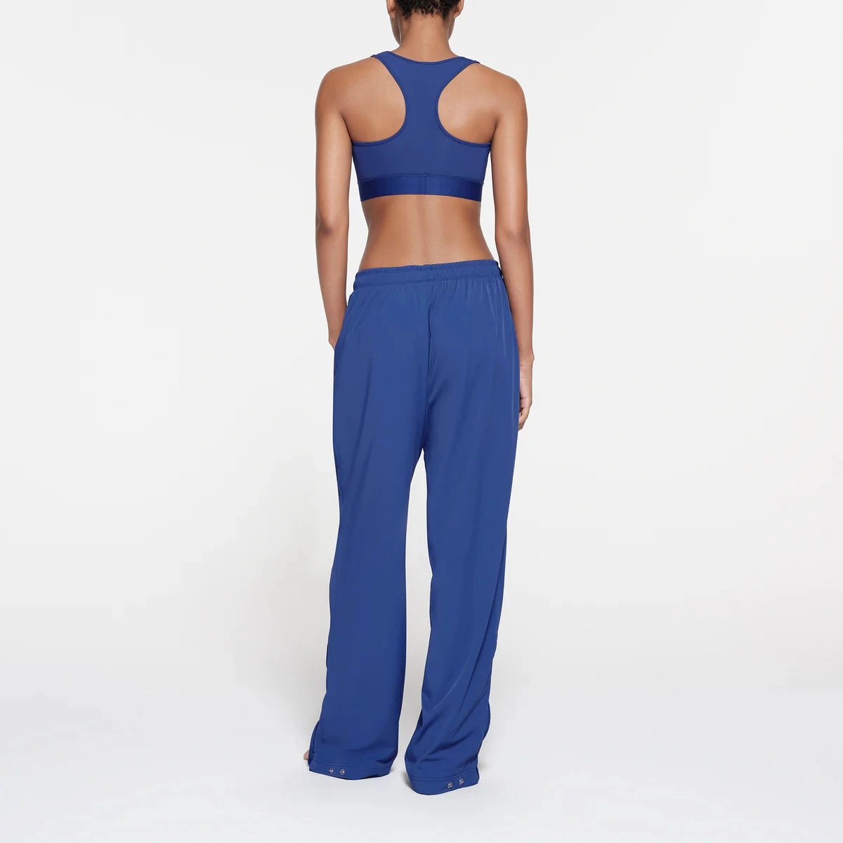 SKIMS TRACK WOVEN NYLON PANT COBALT