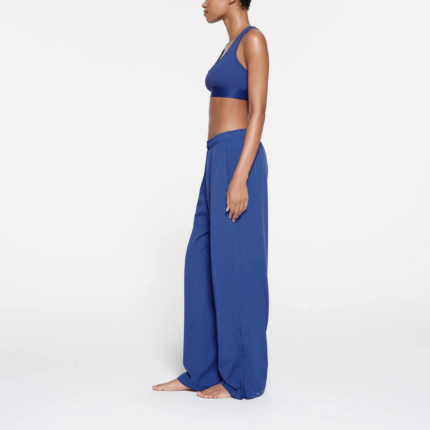 SKIMS TRACK WOVEN NYLON PANT COBALT