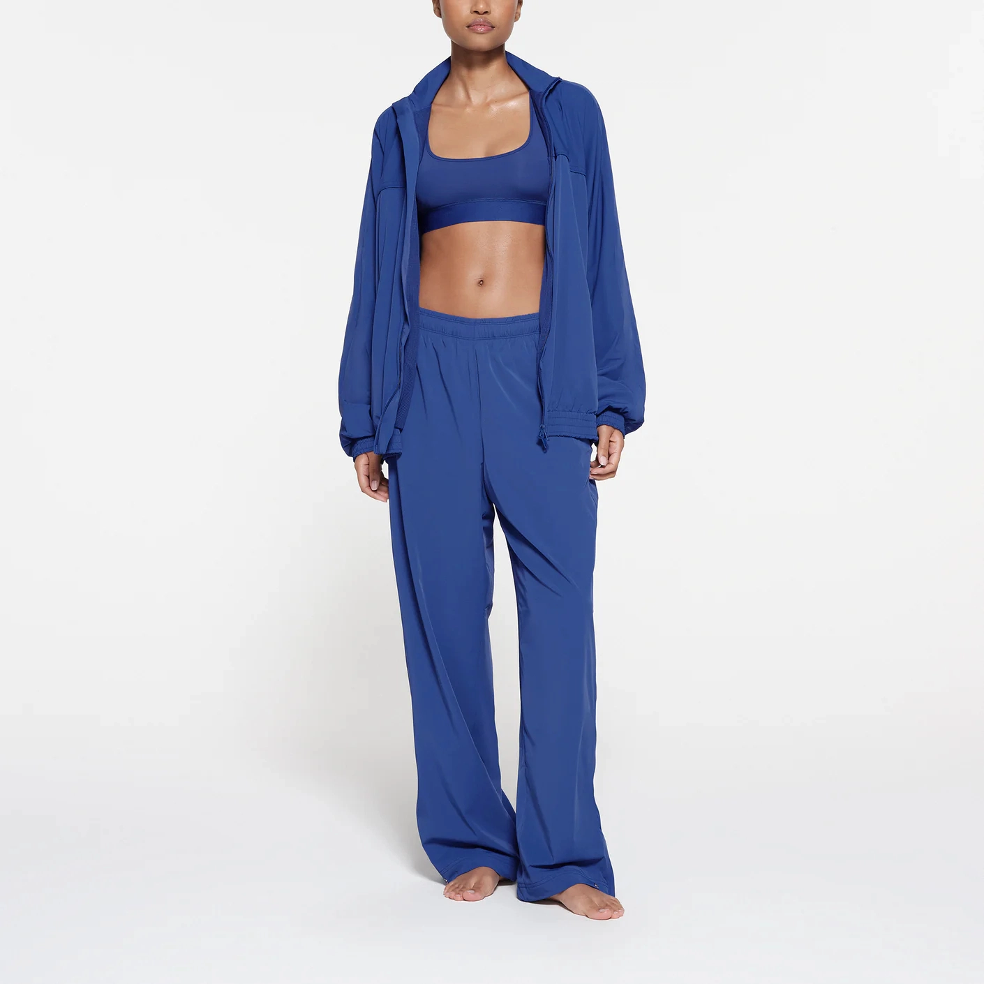 SKIMS TRACK WOVEN NYLON OVERSIZED JACKET COBALT