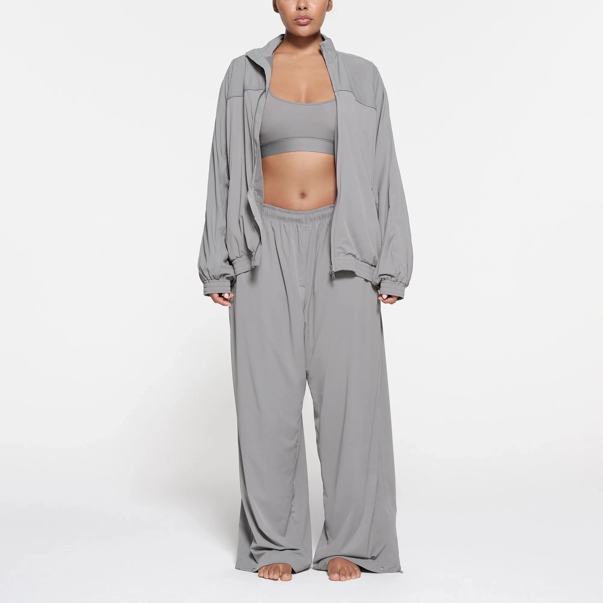 SKIMS TRACK WOVEN NYLON OVERSIZED JACKET PACIFIC