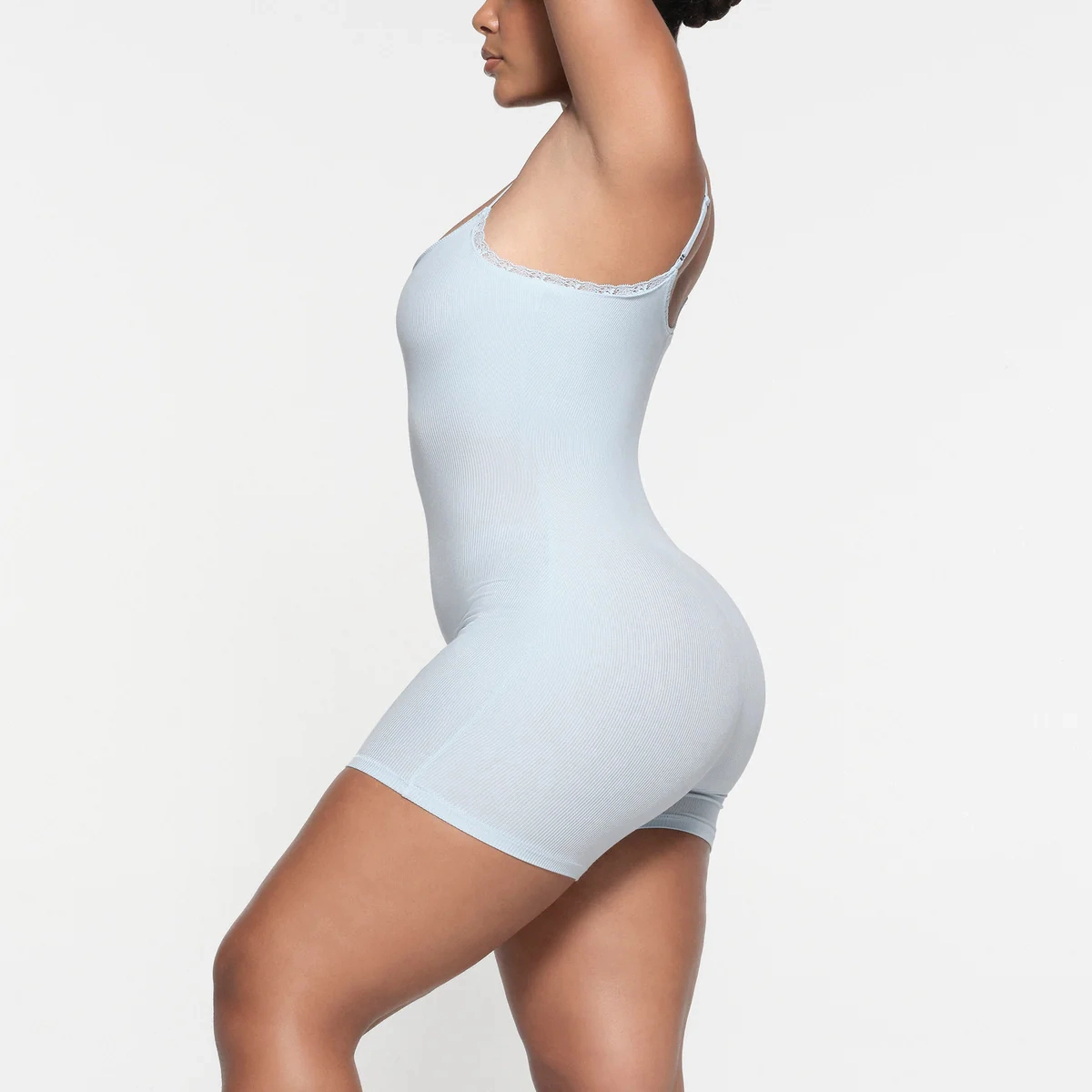 SKIMS SOFT LOUNGE LACE ONESIE CELESTE