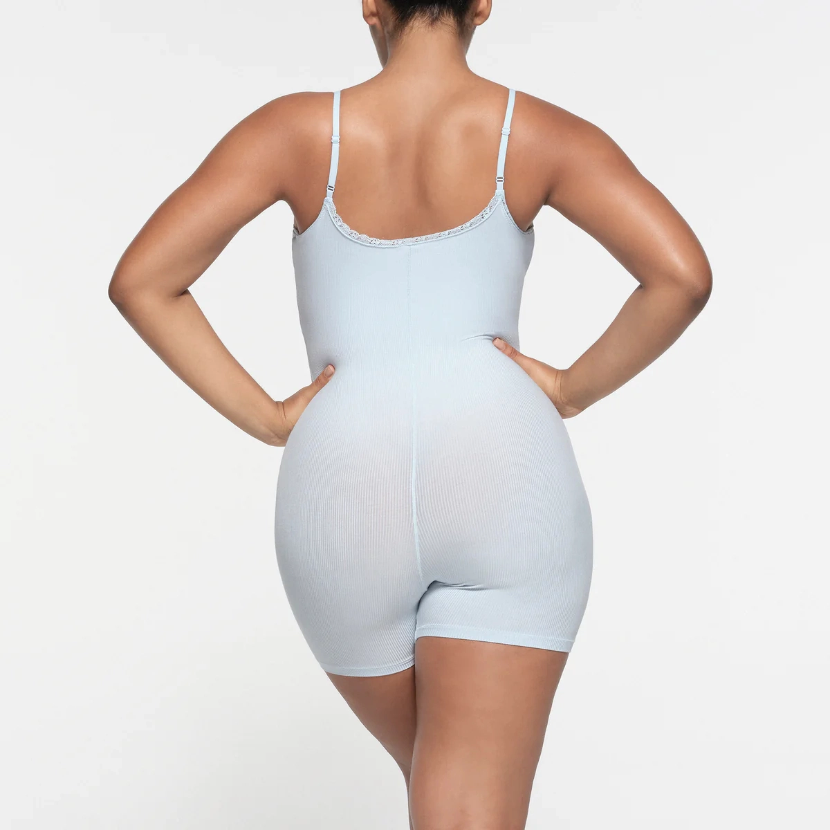 SKIMS SOFT LOUNGE LACE ONESIE CELESTE