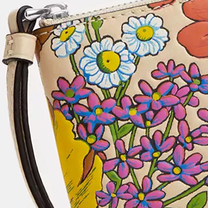 COACH Corner zip wristlet 16