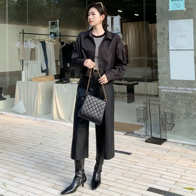 美洋 黑泽斜纹肌理抽绳下摆翻领排扣短款长袖衬衫 女款 黑色