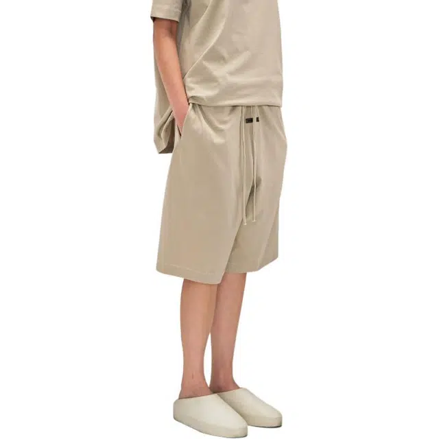 Fear of God Essentials SS25 25 PRING DROP1 BASKETBALL FLEECE SHORT W TIMBER ESSENTIALS FEAR OF GOD