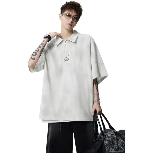 GEOFFREY B. SMALL T