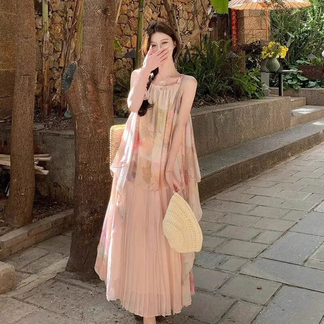 纤丝鸟 温柔气质度假风不规则法式时尚吊带连衣裙 女款