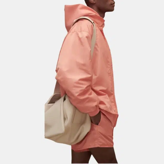 Fear of God Essentials FW22 1977 Nylon Coaches Jacket Coral Logo