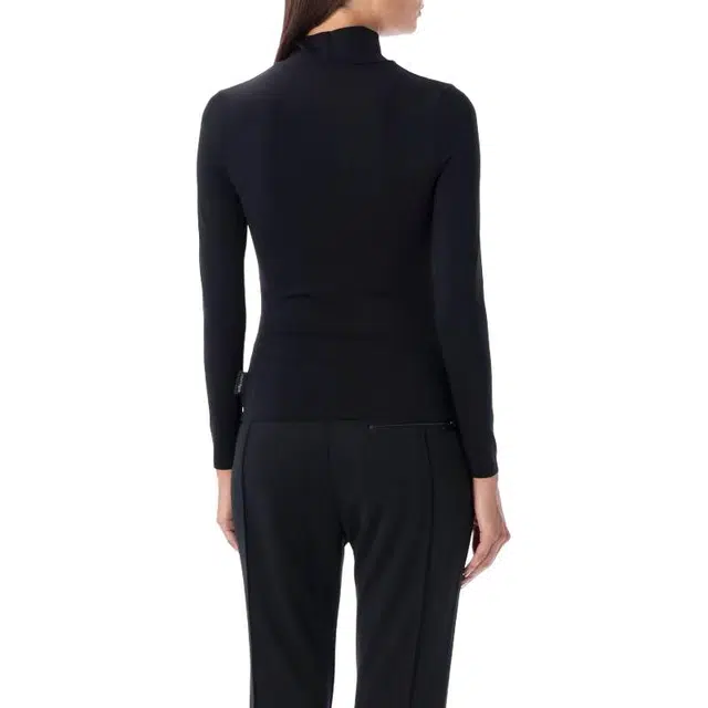 COURREGES T