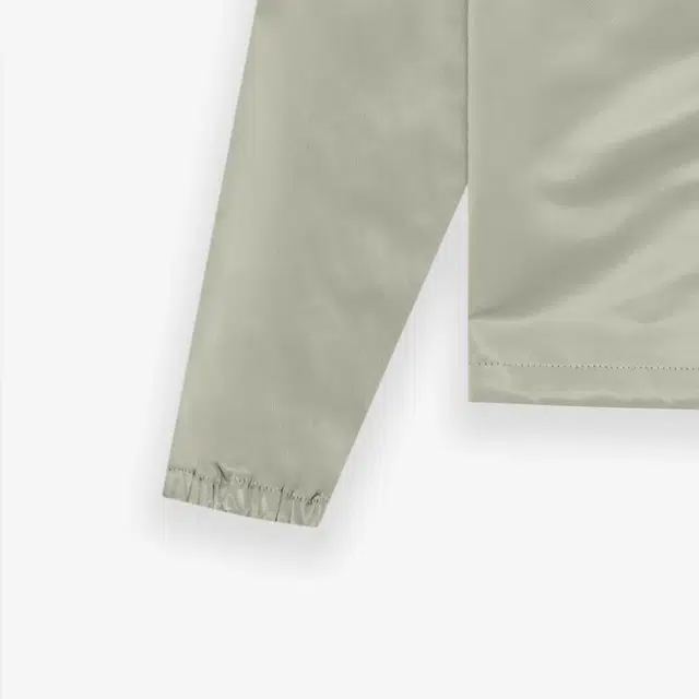Fear of God Essentials Coaches Jacket Seafoam Logo