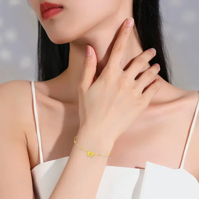 中国珠宝 在逃公主蝴蝶结 轻奢小众设计高级感气质甜美年轻显白转运珠手饰 日常通勤时尚 足金 一口价 黄金手链 女款
