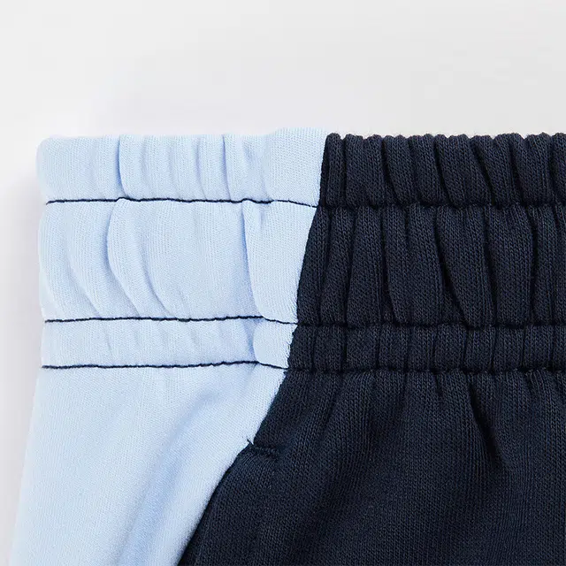 中小童 安踏儿童 复古拼接字母中腰舒适透气束脚针织运动裤 纯亚蓝