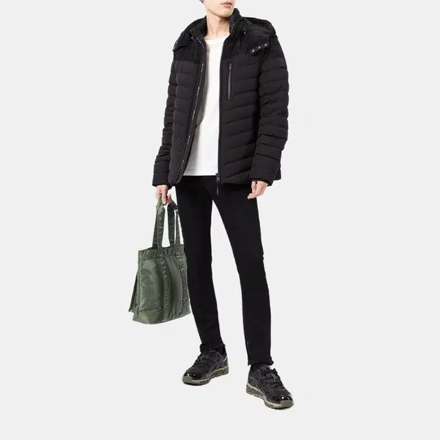 Moose Knuckles Muskeg Logo