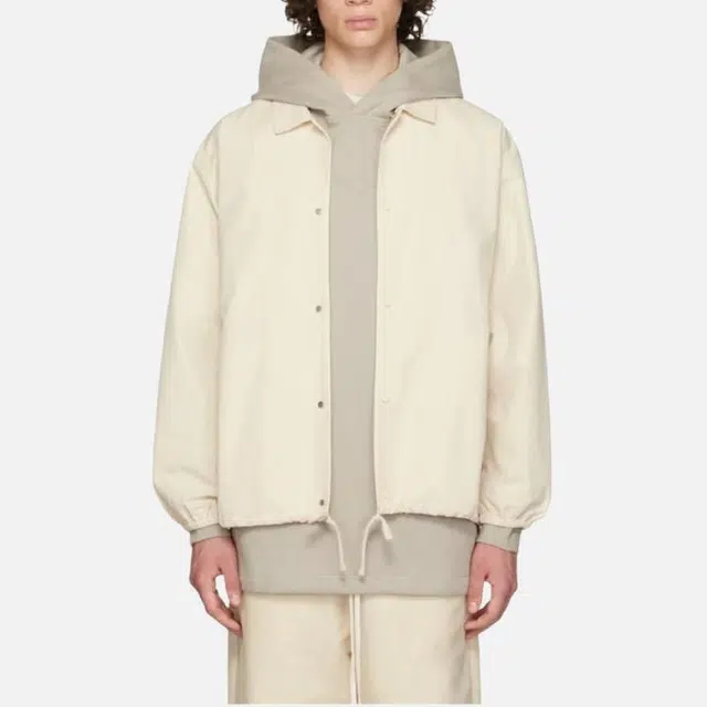 Fear of God Essentials FW22 1977 Nylon Coaches Jacket Egg shell Logo