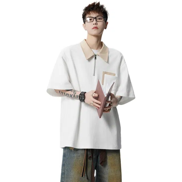 GEOFFREY B. SMALL Polo