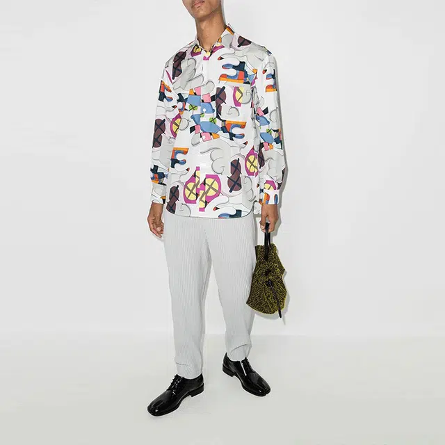 CDG x KAWS
